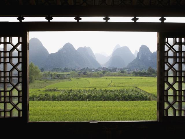 Rice Fields and Karst Peaks Viewed Through a Window Frame, Yangshuo, China