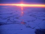 Ice Breaker Crossing the Frozen Baltic Sea at Sunrise, Between Sweden and Finland