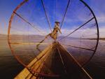 A Fisherman With A Large Fishing Weir _Leg Rowing_ His Canoe, Khaung Daing, Myanmar